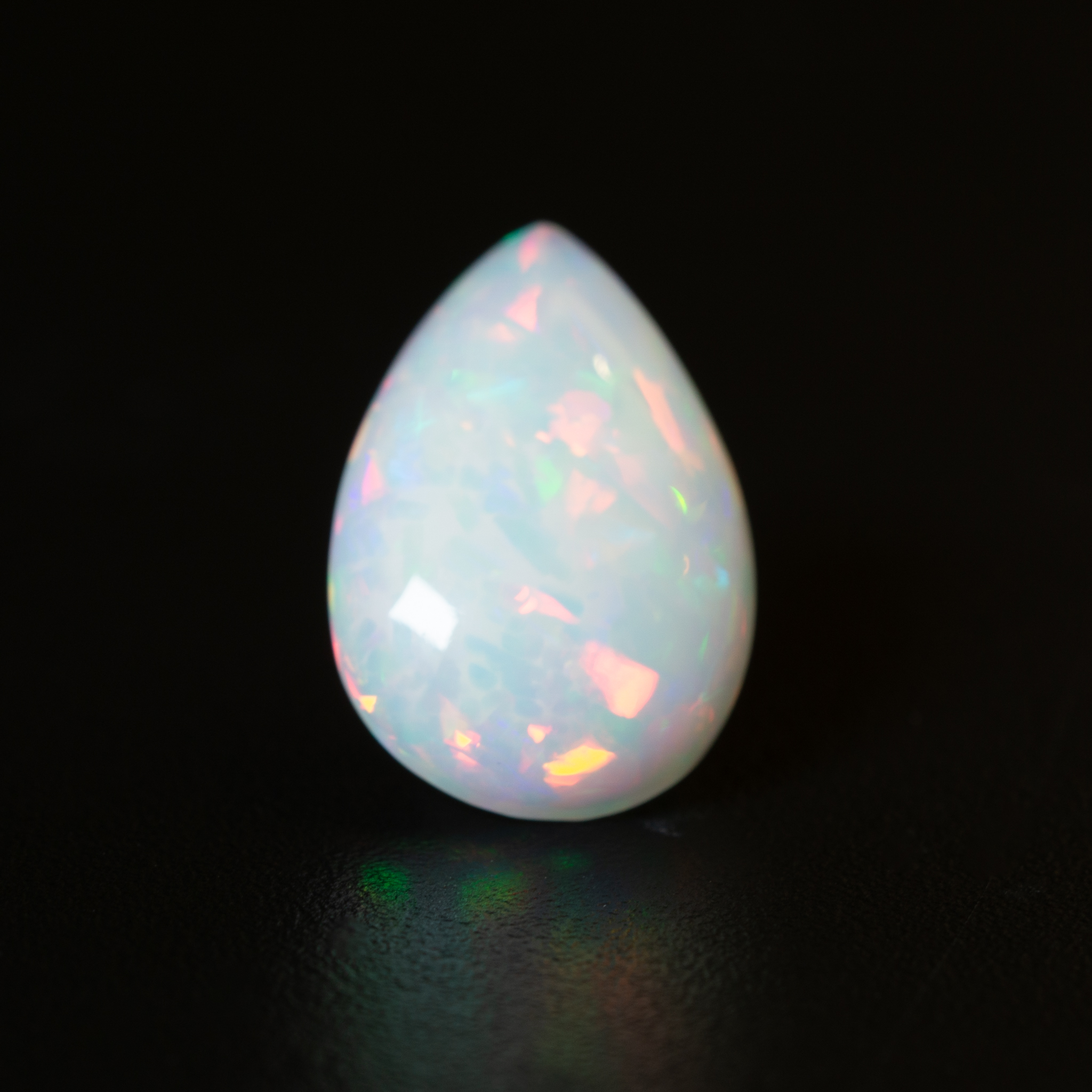 Pear-shape white opal